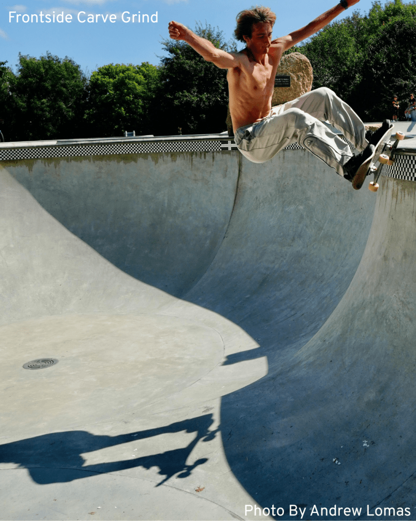 A gnarly older skater executes a carve grind in a bowl, demonstrating his expertise and passion for skateboarding
