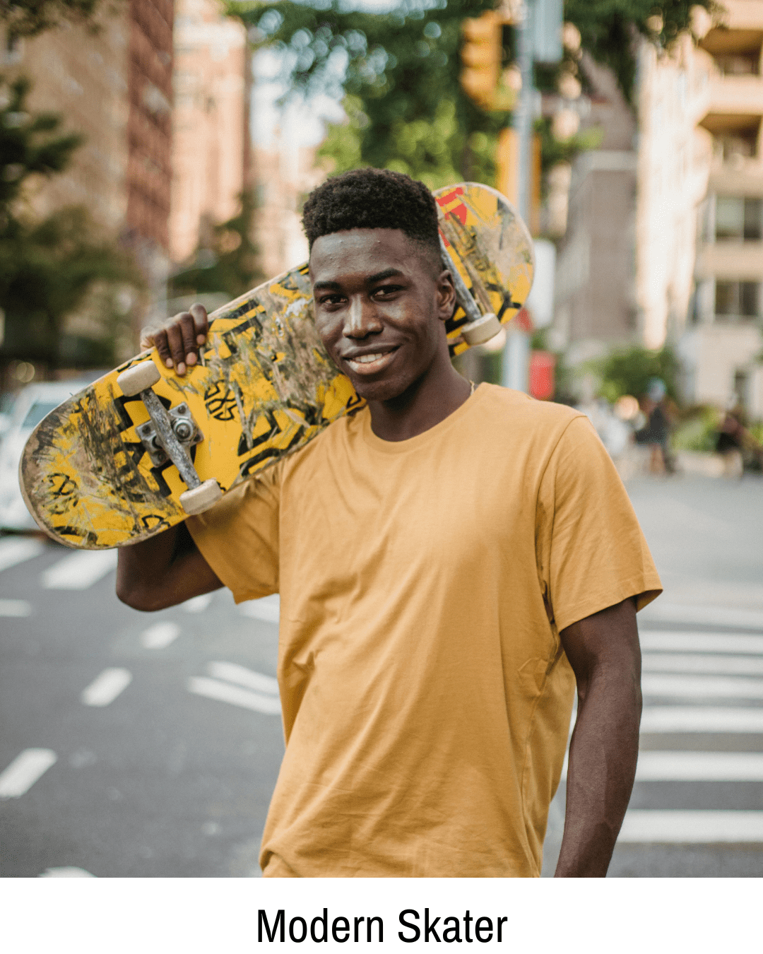 A man in an urban setting holds a skateboard, showcasing contemporary skateboarding for skatershomebase.com.