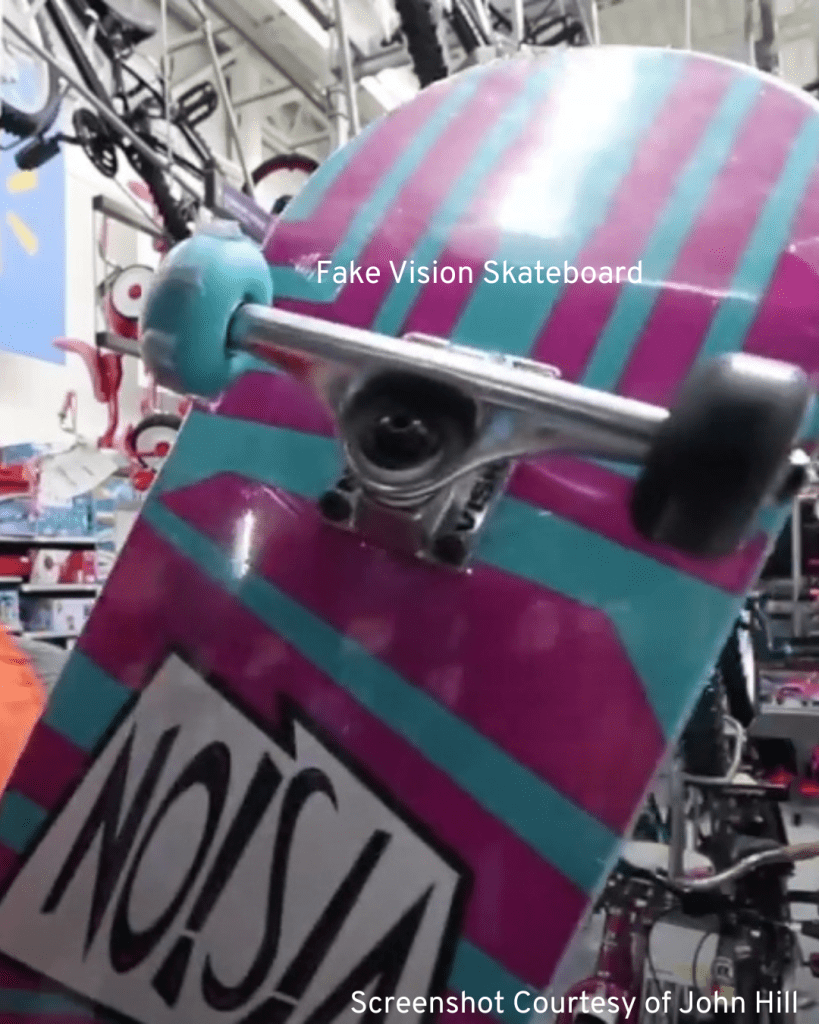 A skateboard featuring the word "Noosa," highlighting key details for identifying a fake Vision skateboard.